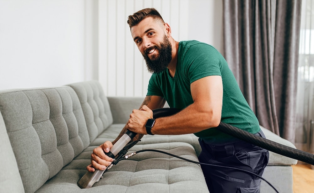 Professional upholstery cleaning Boca Raton service in action, showcasing a clean and refreshed sofa.